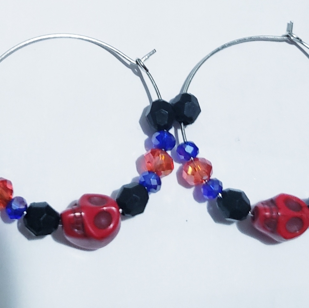 Red and blue skull hoop earrings